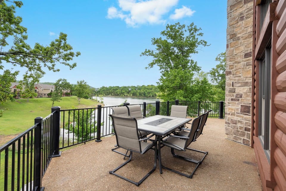 Beautiful overlooking the lake on the main deck with two outdoor tables