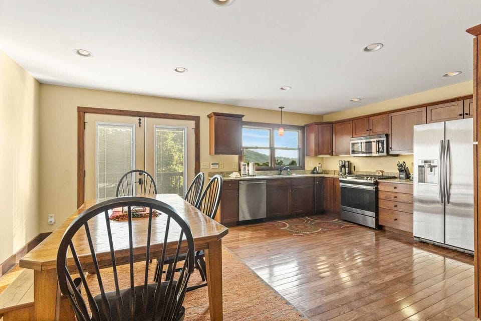 Dining and Kitchen with Access to the Back Deck