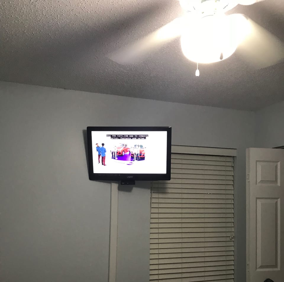 Guest Bedroom Wall Mounted TV