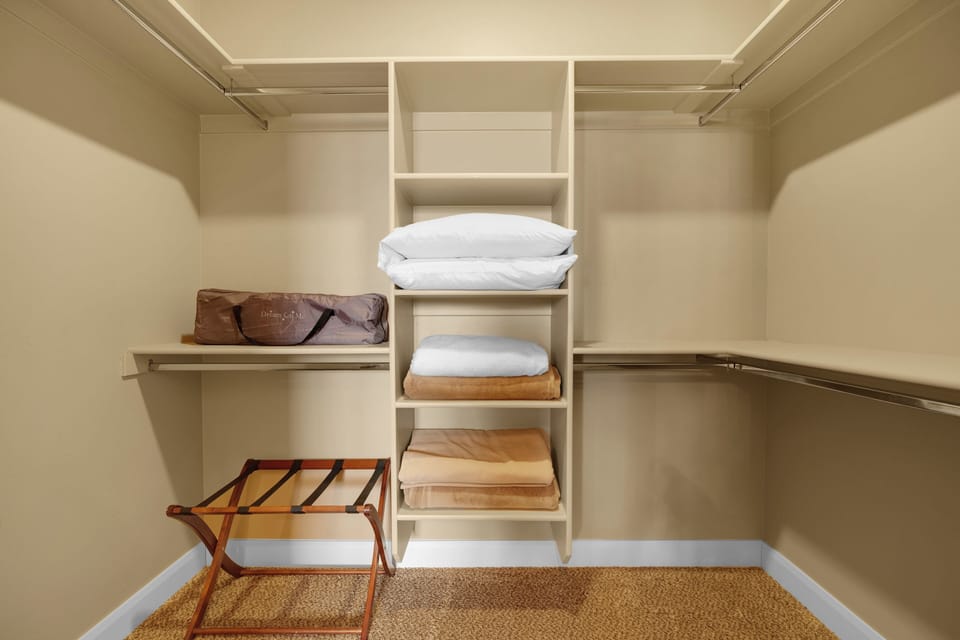 Walk in closet from master bathroom