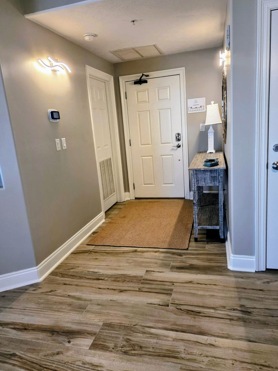 Entry Foyer w/Laundry room to the left