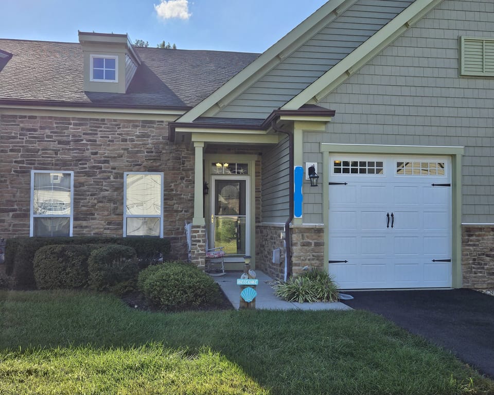 Front Entry with driveway and garage.