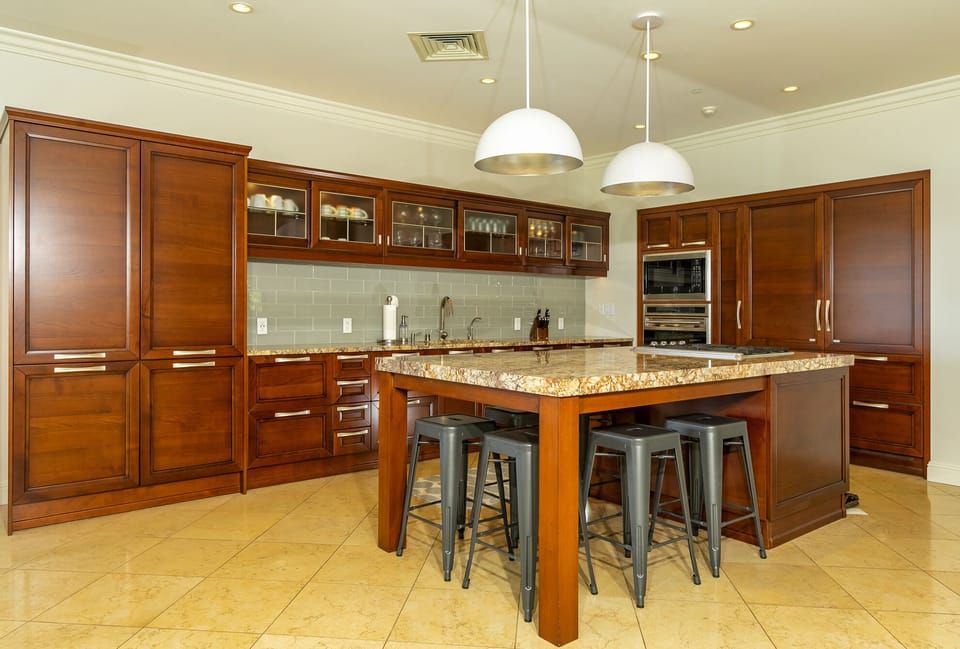Gourmet kitchen with two SubZero refrigerators and professional appliances