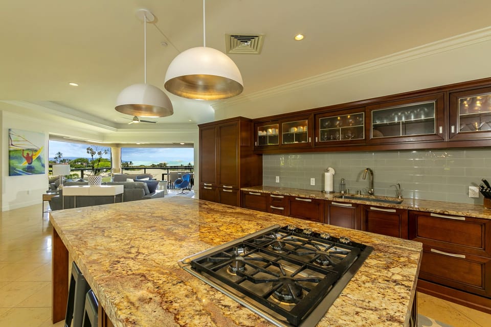 Gourmet kitchen and dining island with seating for six