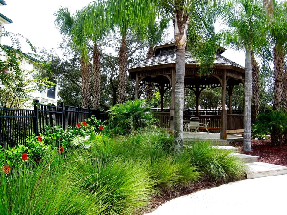 Gazebo in pool area is  a nice shady area to relax, play cards and snack.