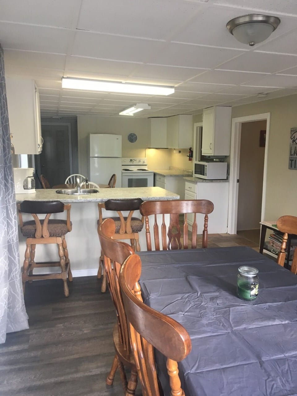 Dining for 12.... 6 at dining table 2 at countertop and table with 4 chairs in main kitchen!