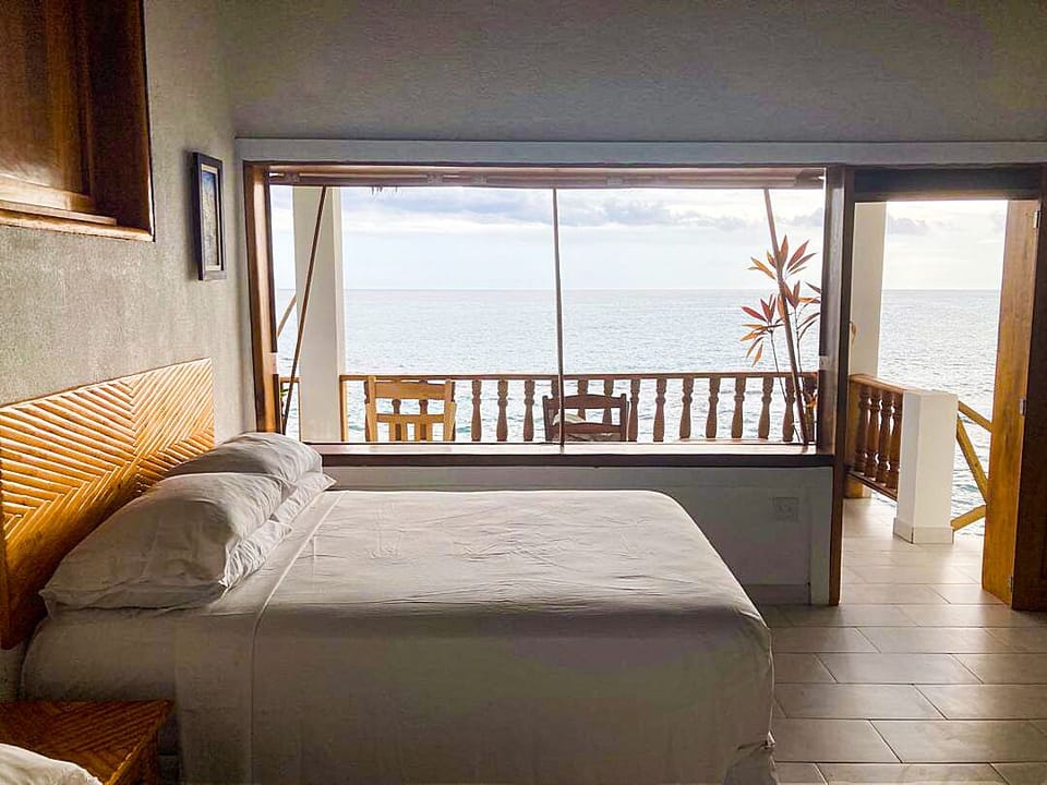 Enjoy a beautiful ocean view from your bed.