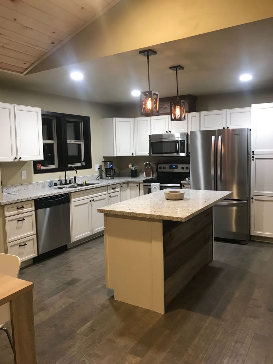 Modern kitchen with traditional reclaimed barnwood from the Methow Valley