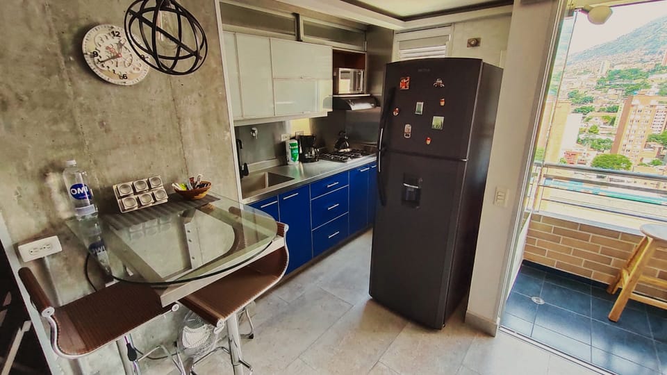 Balcony glass table with excellent views and a fully functional kitchen