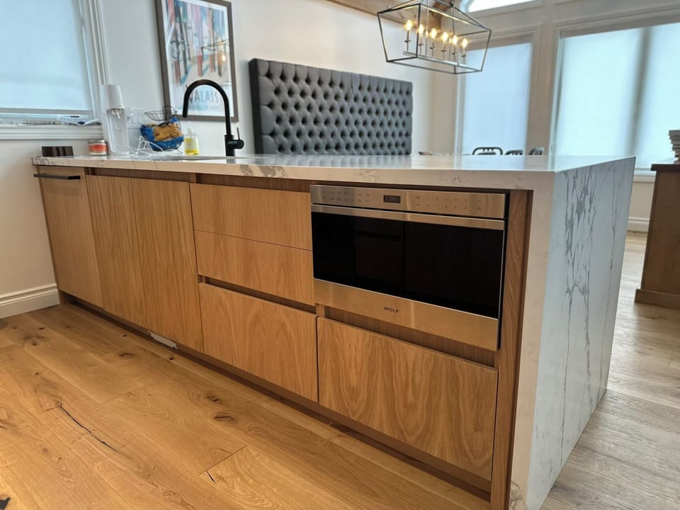 Kitchen Peninsula with dishwasher, microwave and sink 