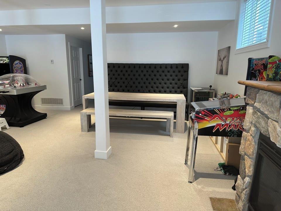 Basement recreation room with second eating dining area