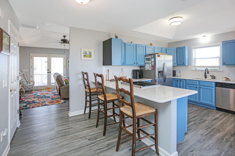 Kitchen Area Opens Up to Living Room