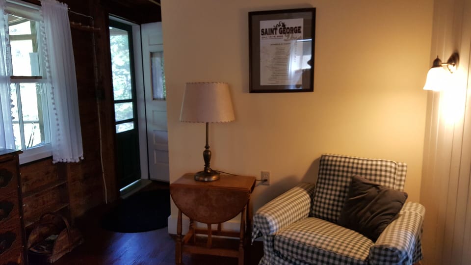 View of living room nook and door to screened porch.