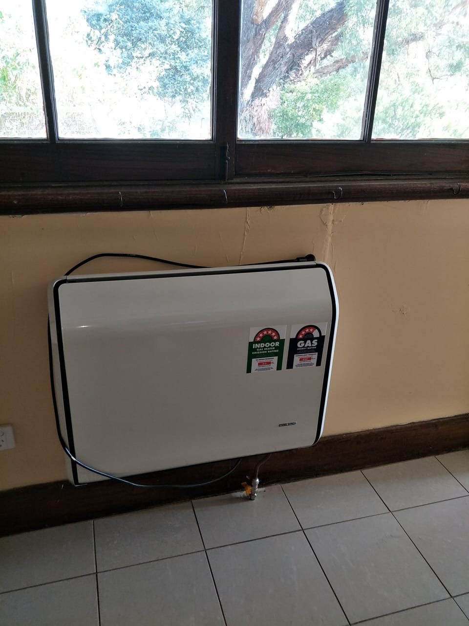 Gas heater in kitchen and backroom area