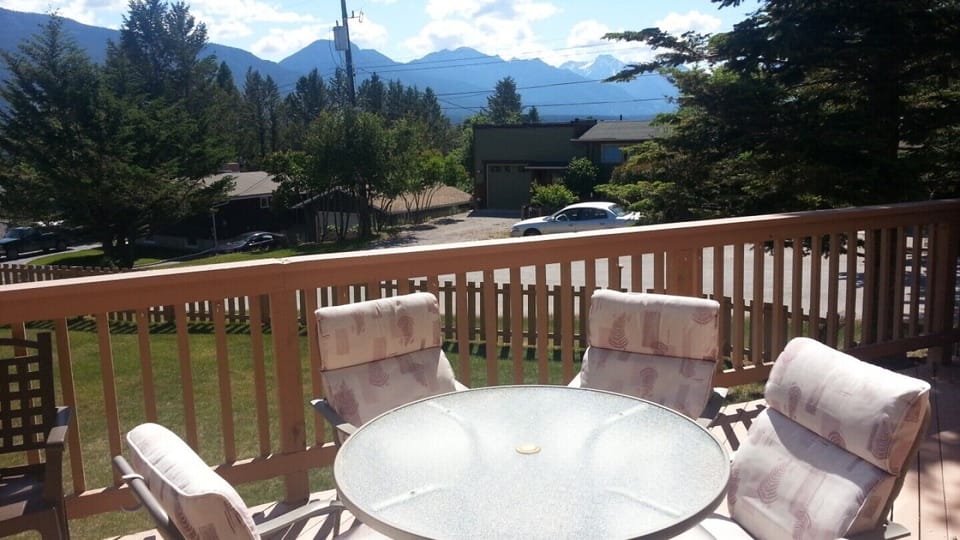 Deck with patio table and seating for 8
