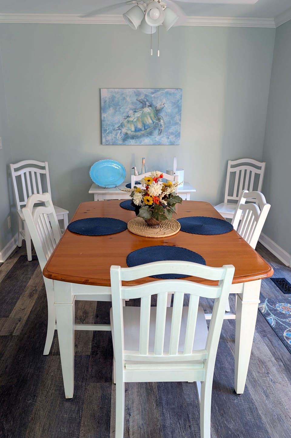 The dining table expands to seat six comfortably.