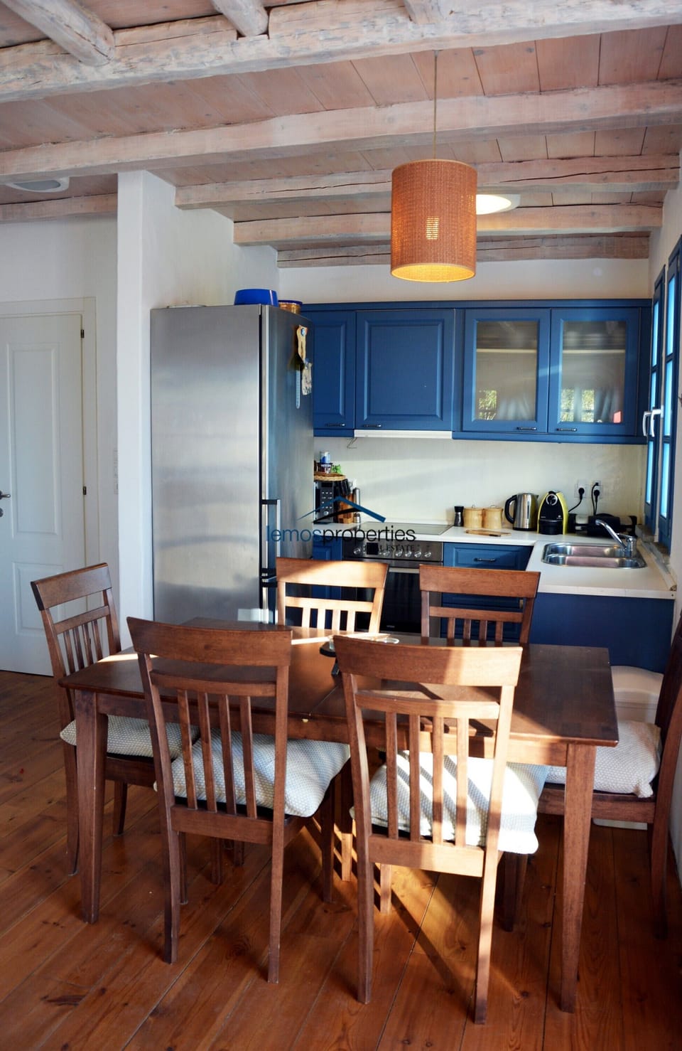 The dining area and kitchen