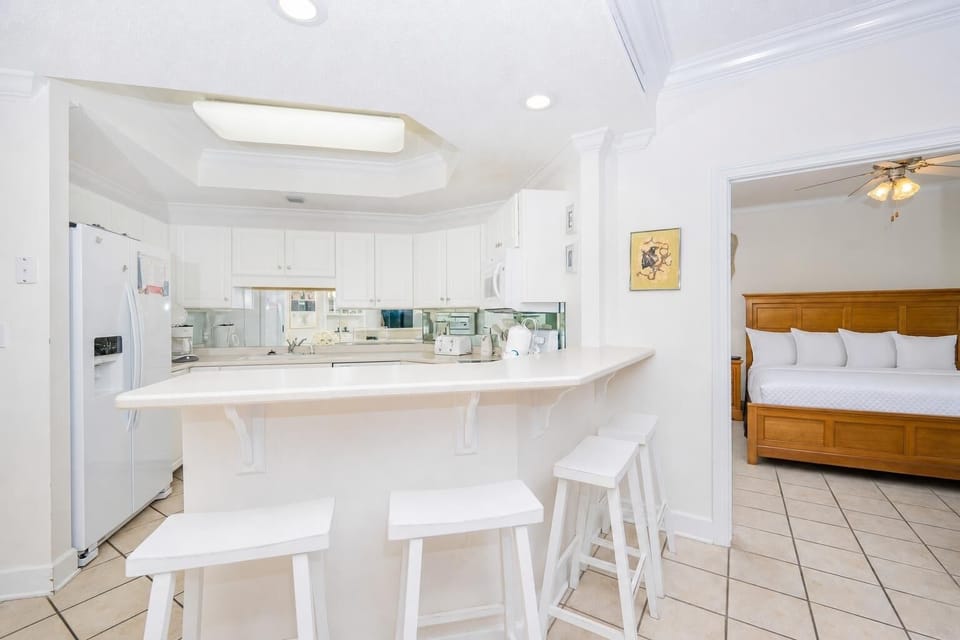 Sip your morning coffee at the breakfast bar and get ready for a day of adventure in this stylish space