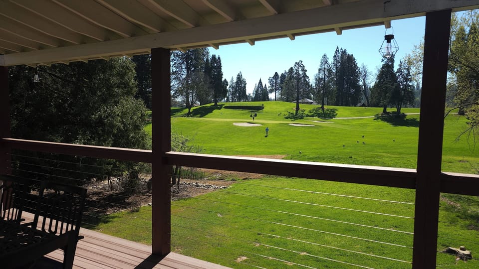 golfers playing the hole
