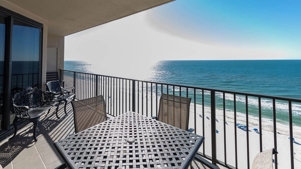 Savor your morning coffee at the outdoor table while enjoying expansive views of the shimmering water