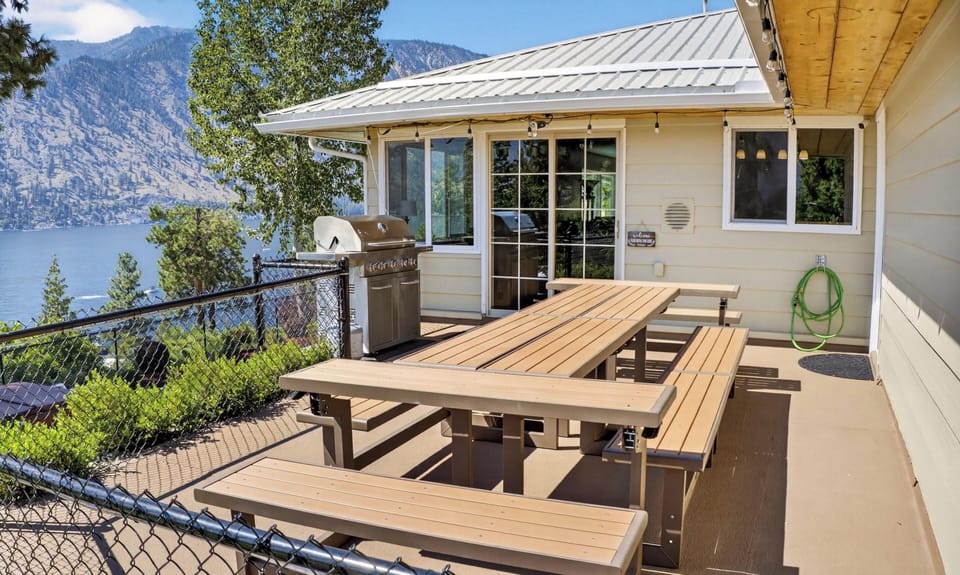 Savor meals on your private deck with stunning lake and mountain views as your backdrop.