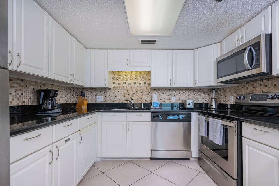 Craft delicious meals and enjoy connecting with loved ones in this inviting, stylish kitchen space