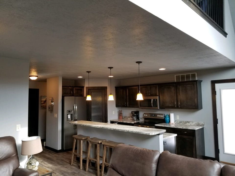 View from living room to kitchen.