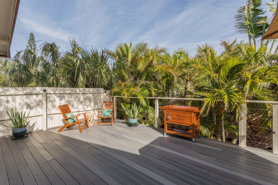 Expansive private deck with Tommy Bahama cooler/beverage center