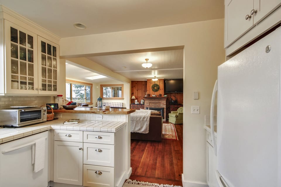 Open floorplan from the kitchen to the dining and living areas.