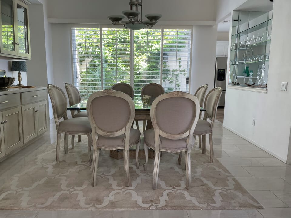 Separate Dining Room, Open Concept, Atrium in background