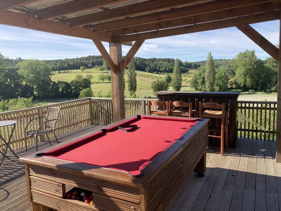 Pool table surrounded by stunning views 