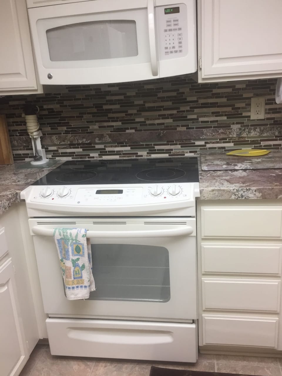 Updated kitchen with back splash. 