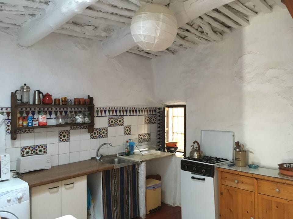 Kitchen is rustic but well equipped.