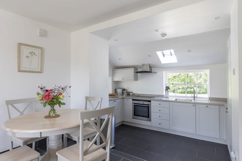 Garden Cottage, Teviot Bank - the kitchen and dining table