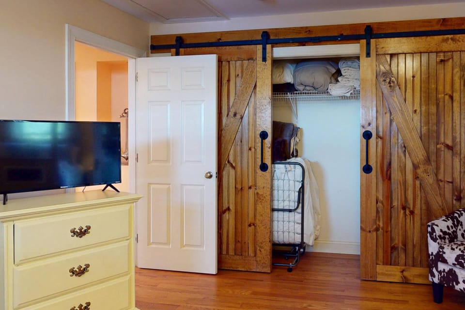 The bunk room has a large closet with a twin trundle