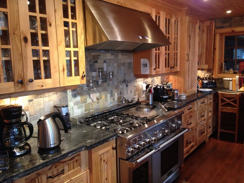 Gourmet Kitchen with Wolfe stove, sub zero separate freezer and sub zero fridge