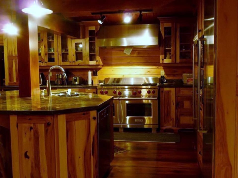 Kitchen with island and wolfe stove