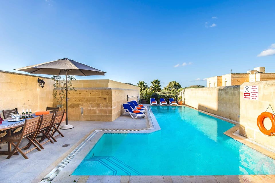 Pool area of Four Winds holiday villa in Gozo
