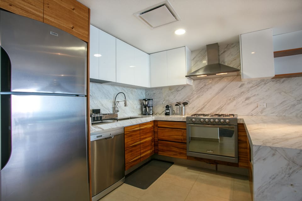 Renewed kitchen with marble countertops