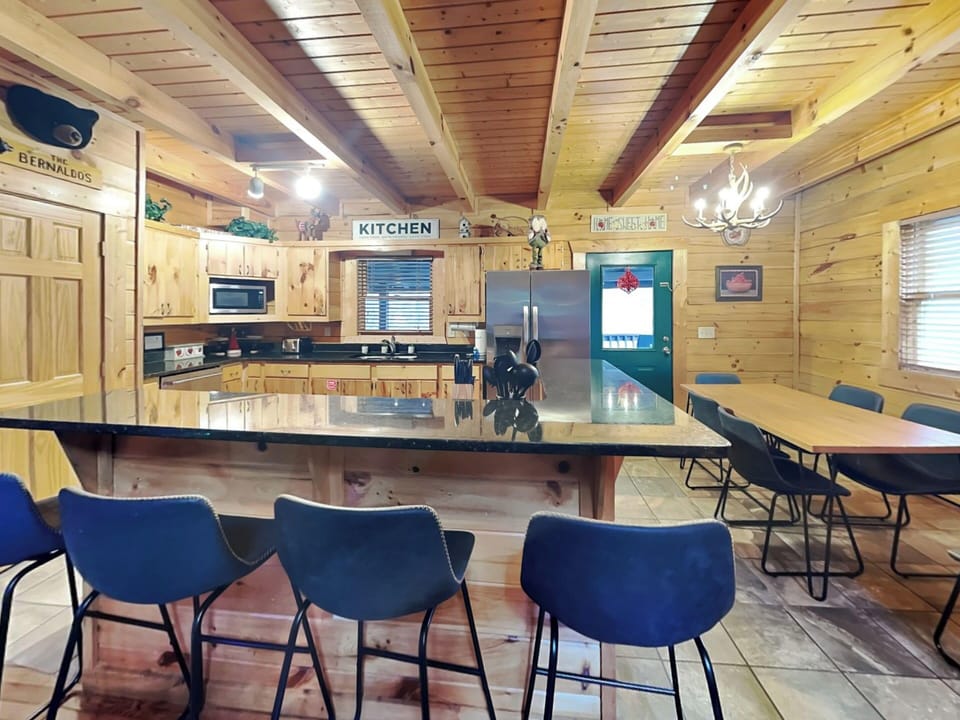 Kitchen, Dining Table and Breakfast Bar - First Floor