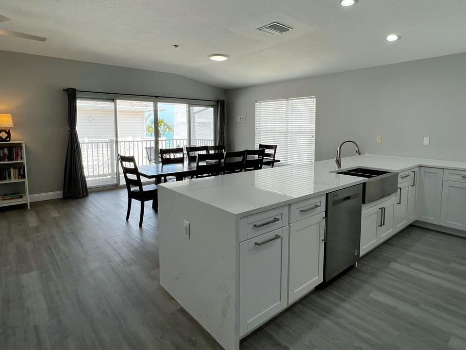 Updated kitchen with a side view of the beach and Gulf! - Updated kitchen with a side view of the beach and Gulf!