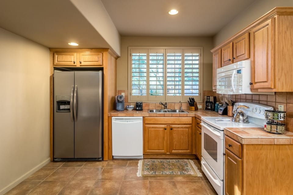Discover a fully equipped kitchen in the garden casita, where culinary creativity blooms. Cook, dine, and savor in style. 🍳🍽️🏡 #KitchenElegance