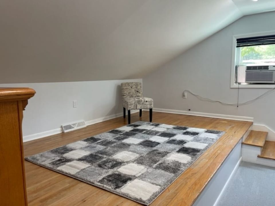 Upstairs bedroom. Across from bed.