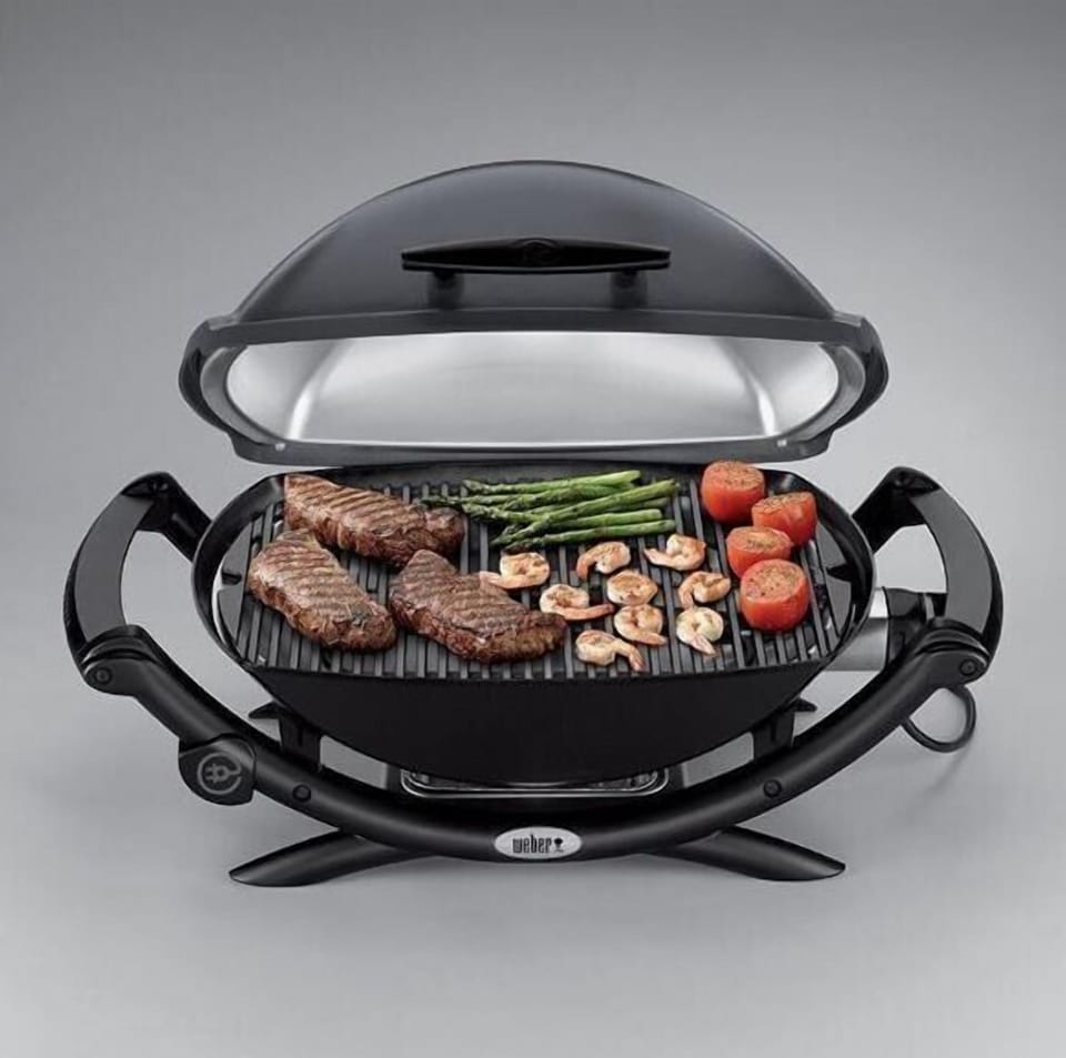 Weber grill on patio for your enjoyment!