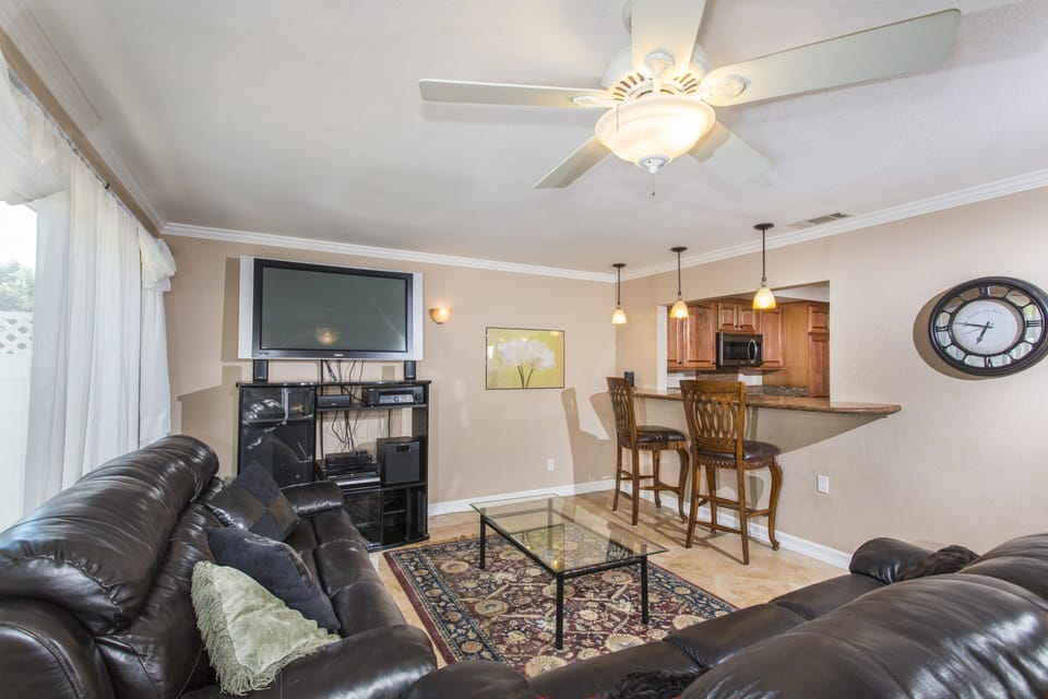 Family Room with Kitchen Pass Through, TV and Couches Updated