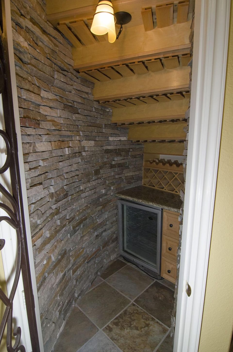 Unique Wine Cave Under Grand Spiral Staircase, Great for Guest Drink Service!