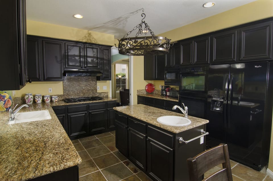 View of Kitchen Adjacent to Formal Separate Dining  Room with Seating for 6!