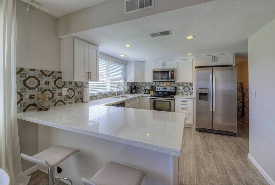 Kitchen with bar sitting
