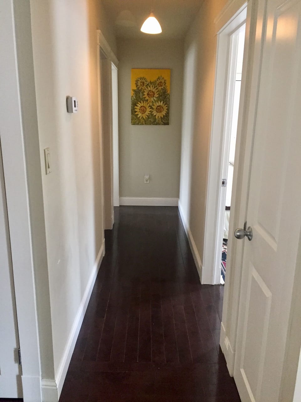 Hall to the right just inside front entry
