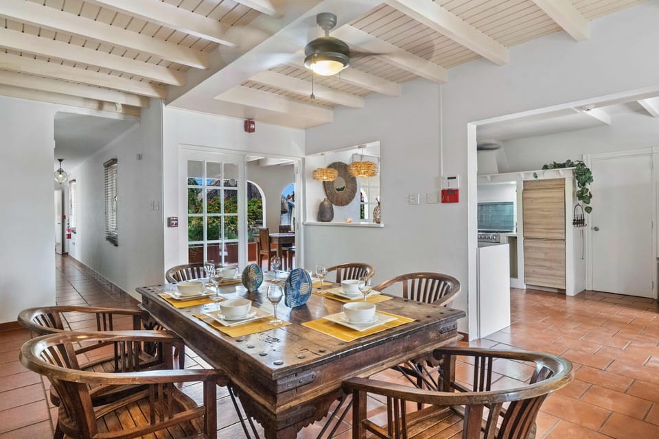 Our rustic dining table offers a welcoming space for meals, combining style and comfort in a unique setting